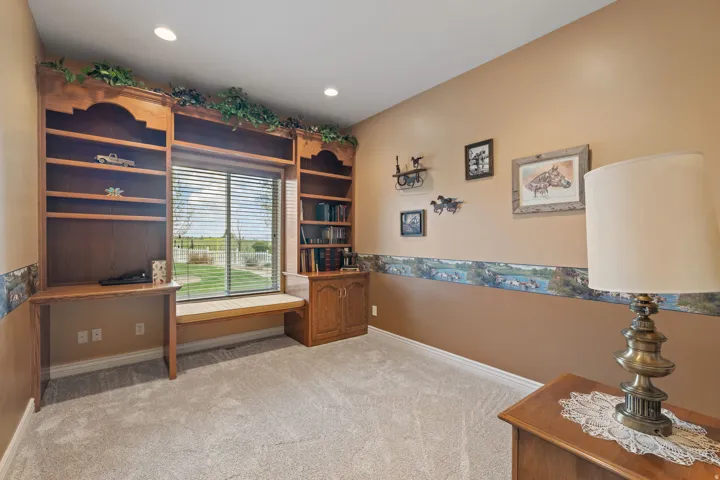 Bedroom number 2, that has been converted into an office with built-ins
