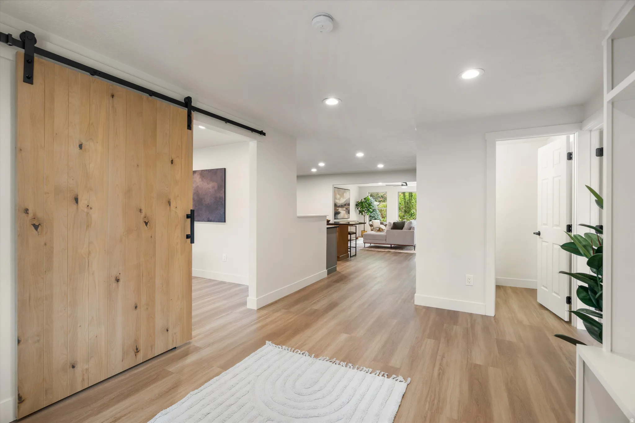 Entry Way with Beautiful Barn Door Entrance to beautifully lit Office / Den / Flex Room