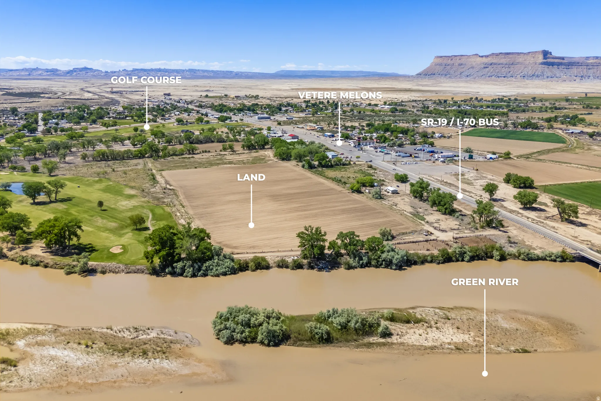 Aerial perspective showcasing expansive land parcel adjacent to the Green River