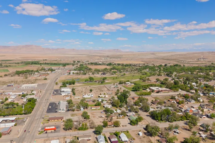 Aerial perspective showcasing a community with varied residential and commercial structures