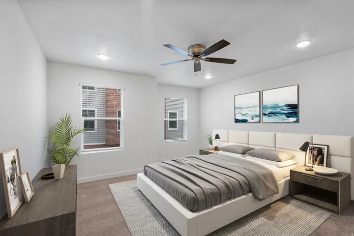 Bedroom featuring neutral-toned walls, recessed lighting, and a ceiling fan