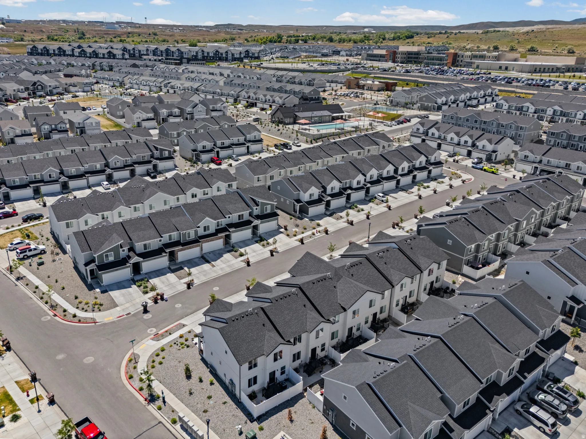 Expansive residential development featuring numerous multi-story townhomes and single-family residences