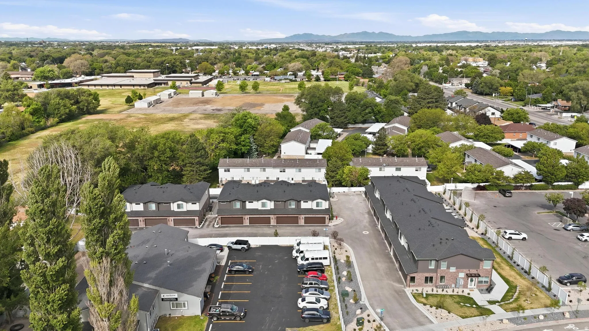 Modern townhome community featuring multi-story units with attached garages