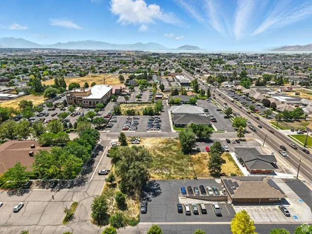 Aerial perspective showcasing a developed commercial and residential area with various buildings
