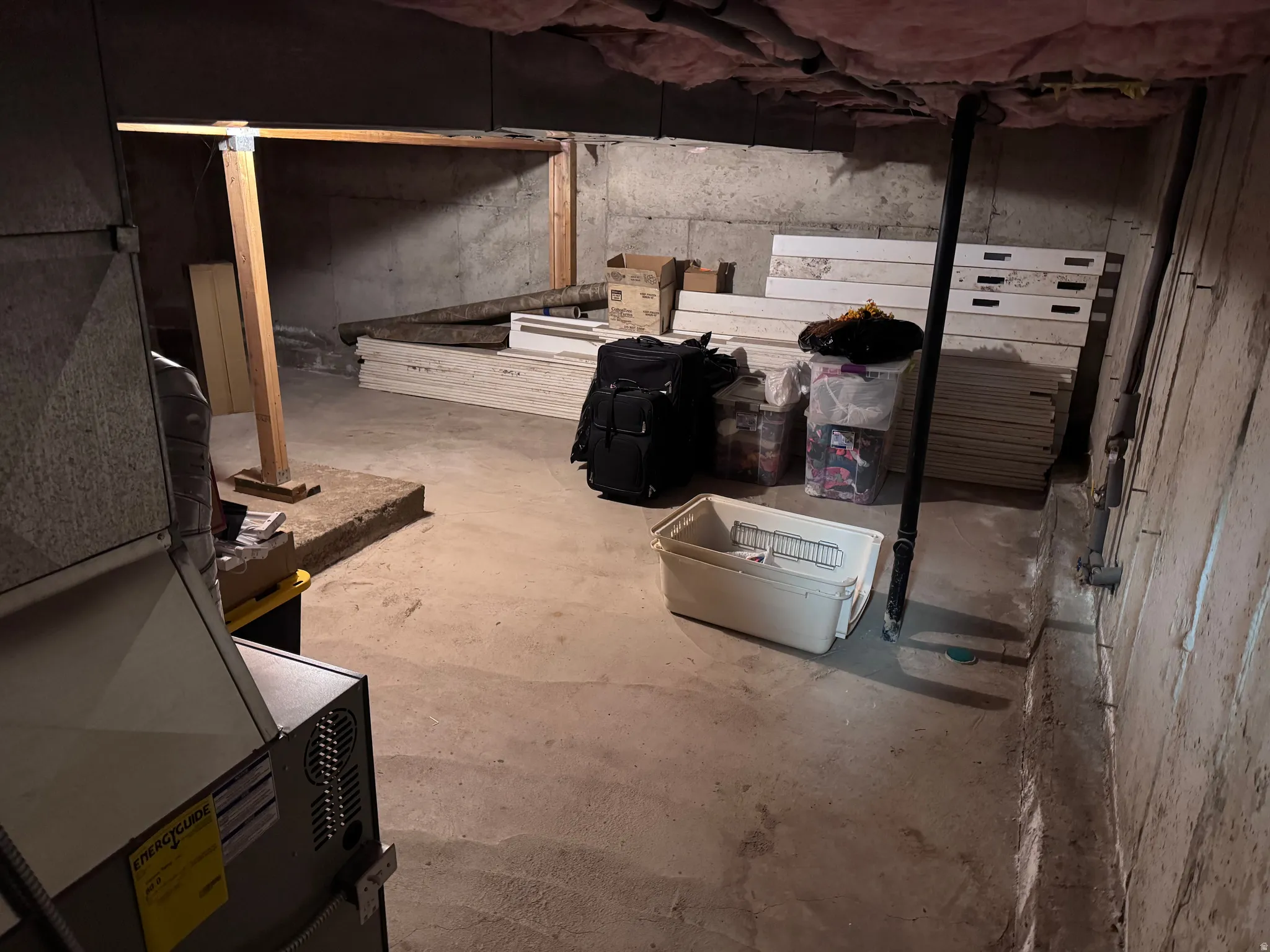 Crawl space, 6'1-2" and a beam where it would be approx 5'.  Great storage