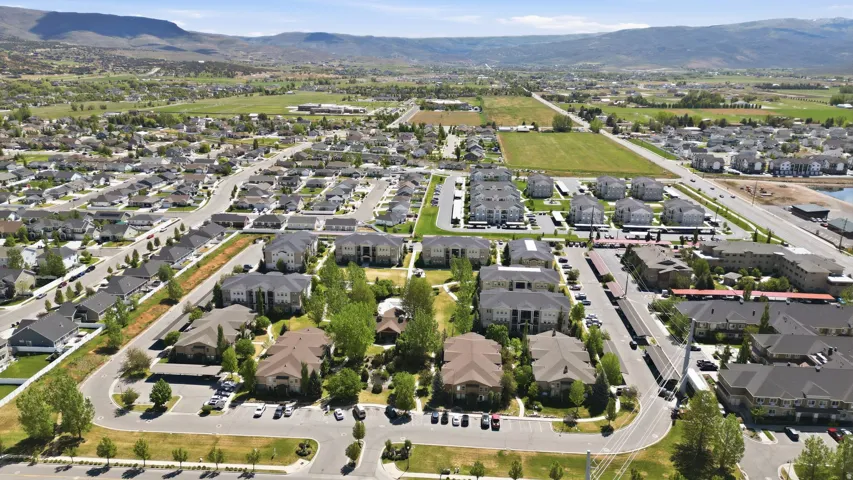 Expansive residential development featuring a mix of single-family homes and multi-story apartment buildings