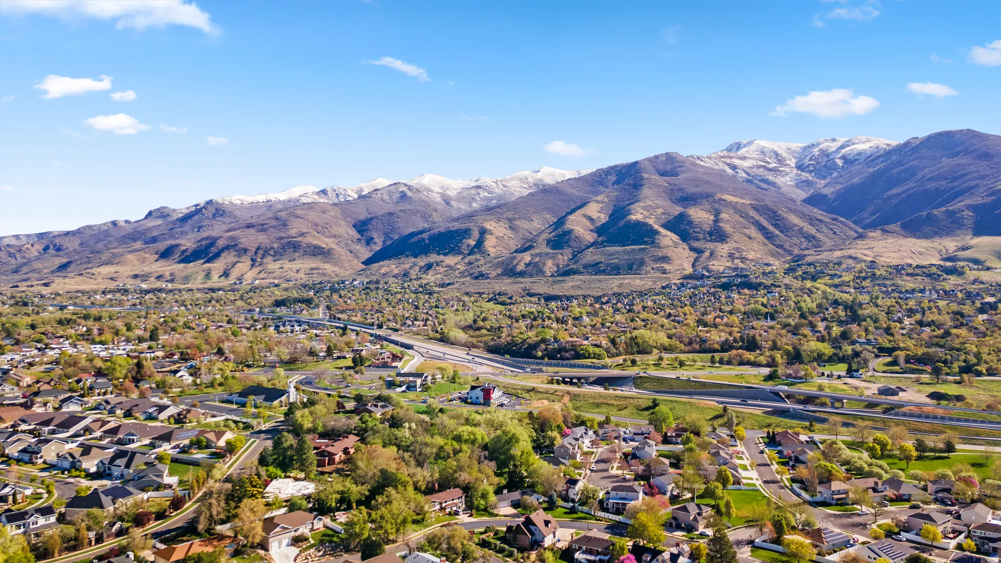 Aerial perspective showcasing a residential area with varied housing styles