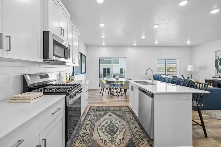 Photos shown are of the Model Home featuring the same floorplan. Finishes and selections may vary from the actual home.