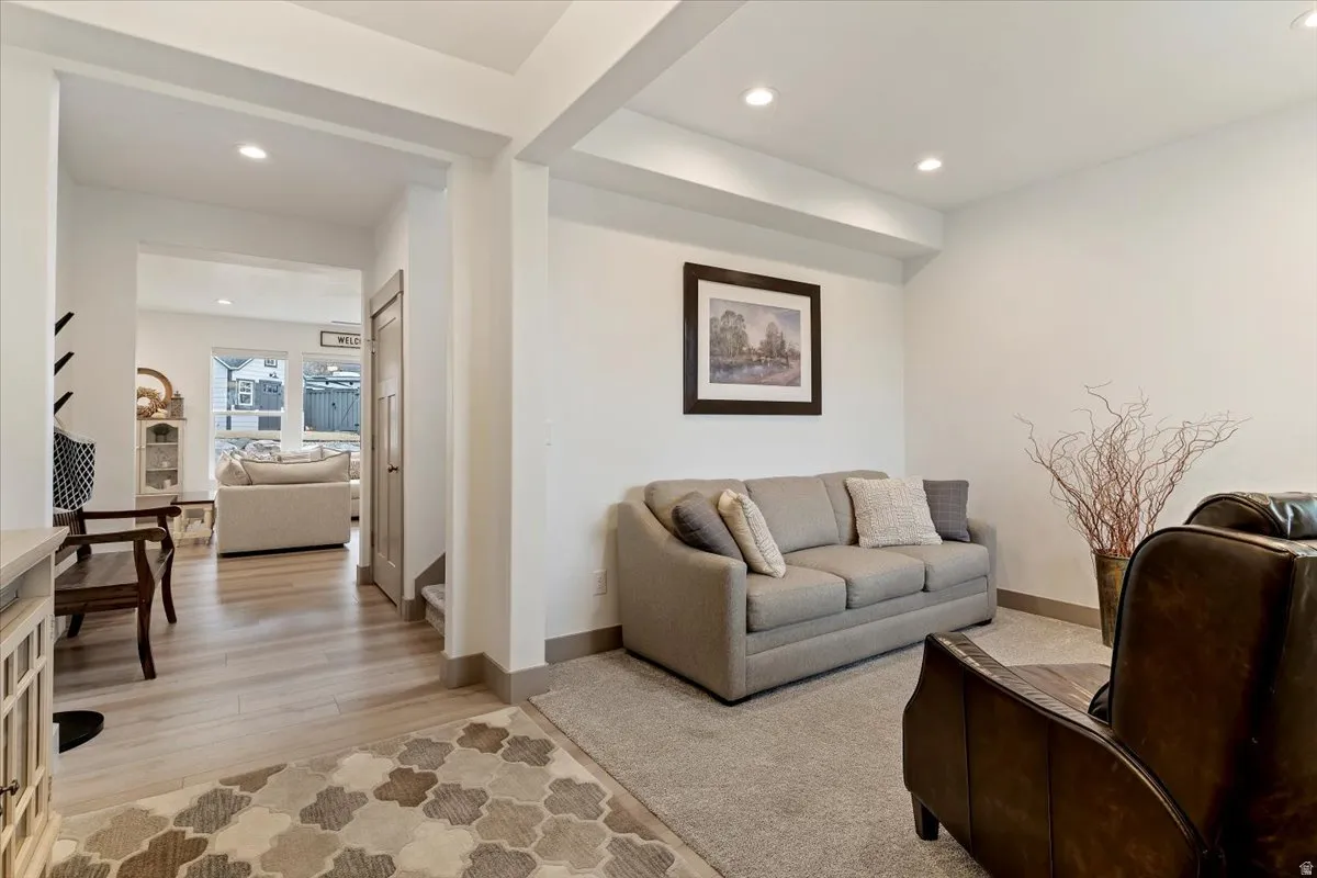 Open concept design featuring a wide entryway and recessed lighting