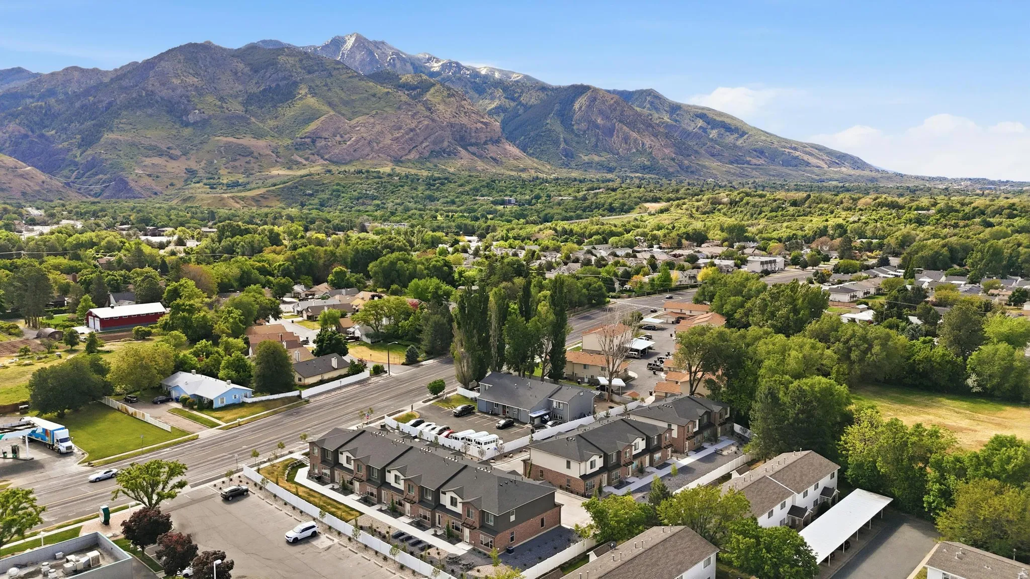Modern townhome community featuring multi-story residences with a uniform architectural style