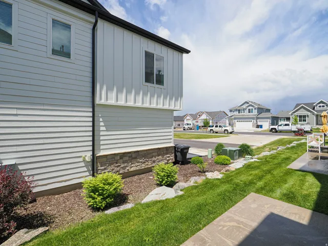 Exterior siding featuring horizontal panels and vertical board-and-batten sections