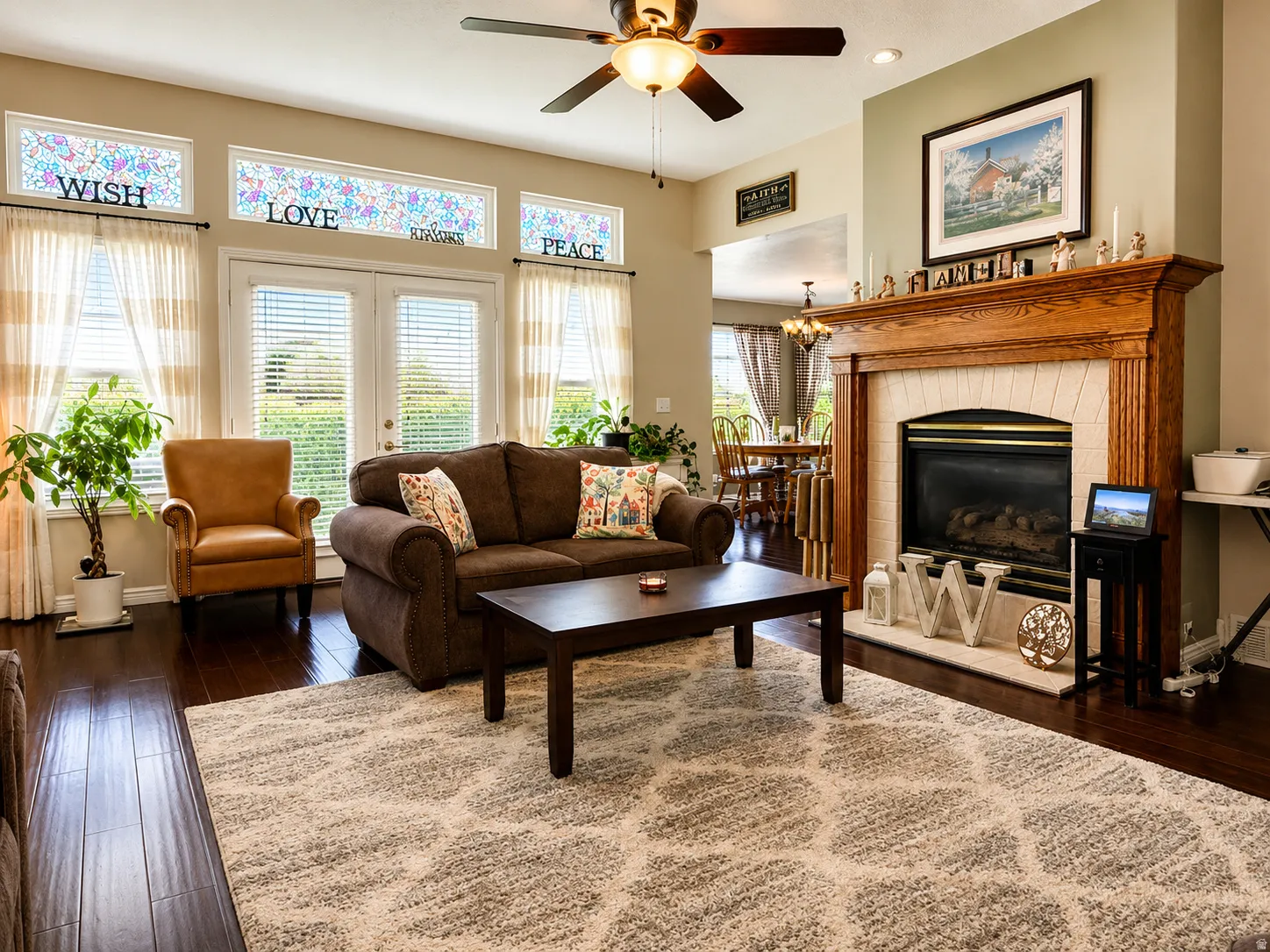 Living area featuring bamboo flooring, gas fireplace and French door