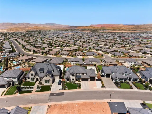 Expansive residential neighborhood featuring numerous single-family homes with pitched roofs and varied architectural styles