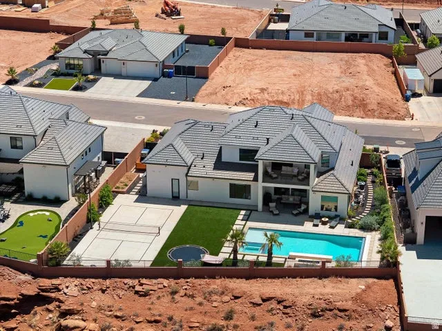Contemporary residence with a multi-level exterior and covered patio spaces