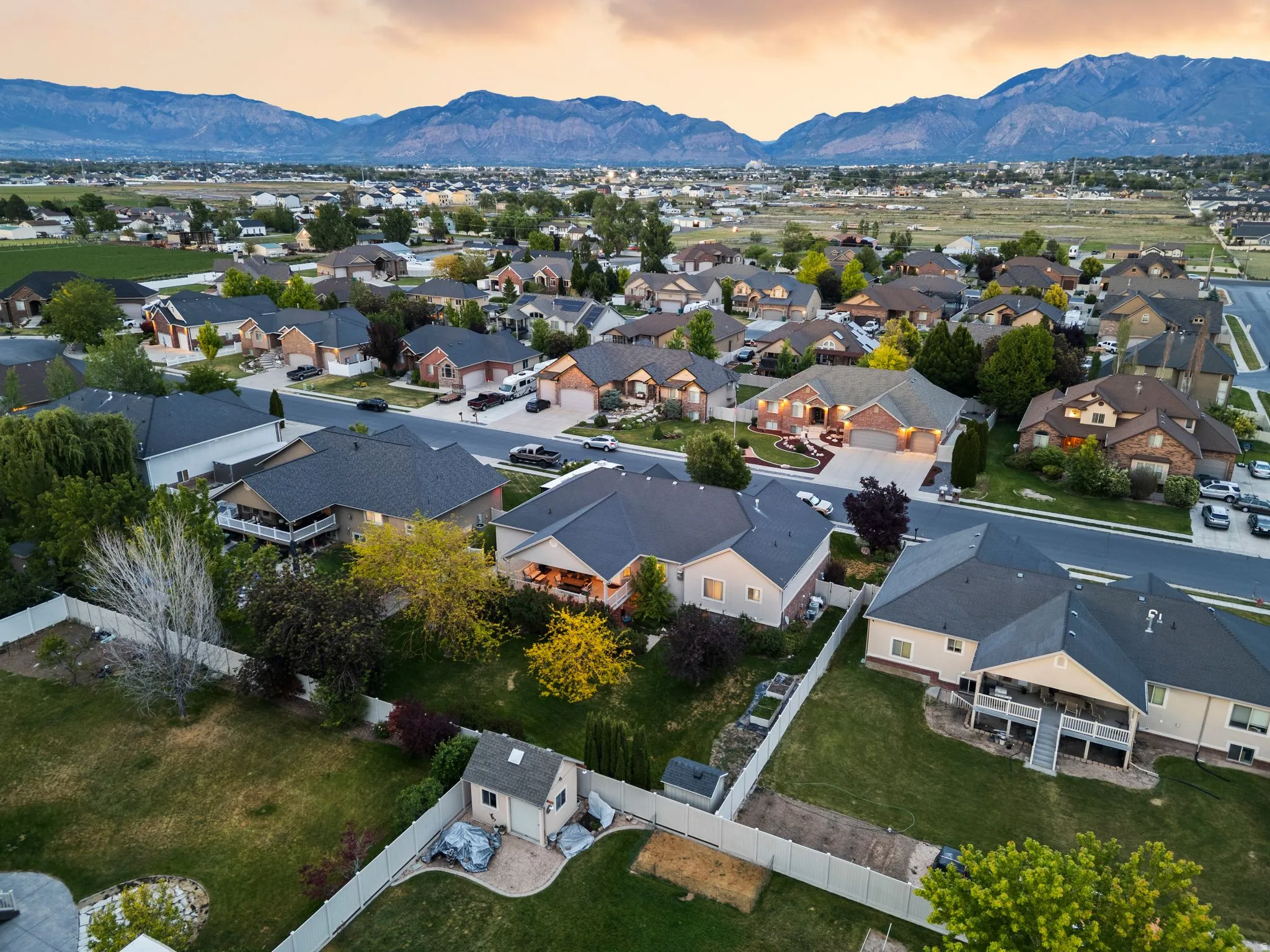 Suburban neighborhood setting with mountain backdrop and residential architecture