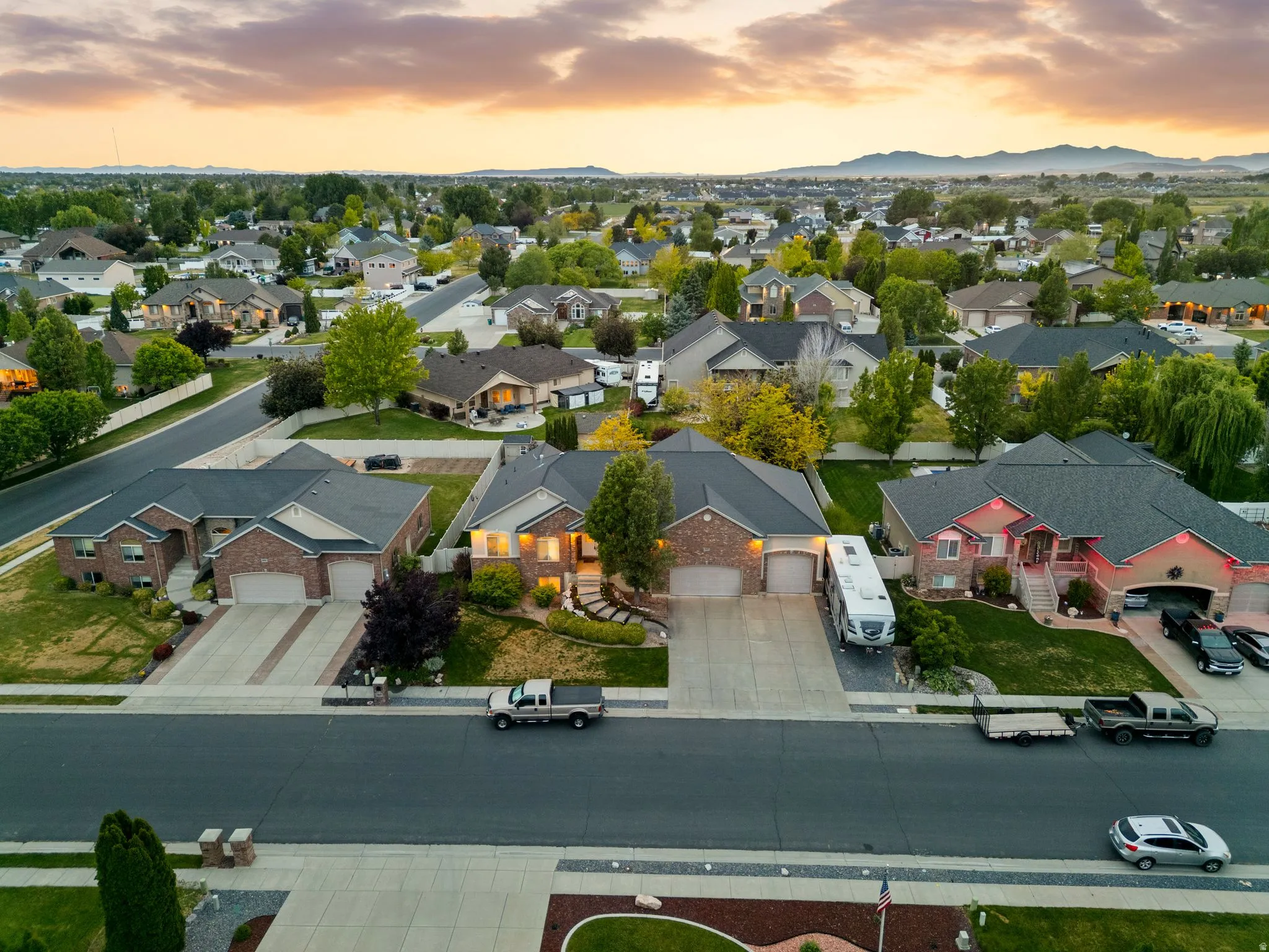 Suburban neighborhood featuring varied architectural styles and mature landscaping