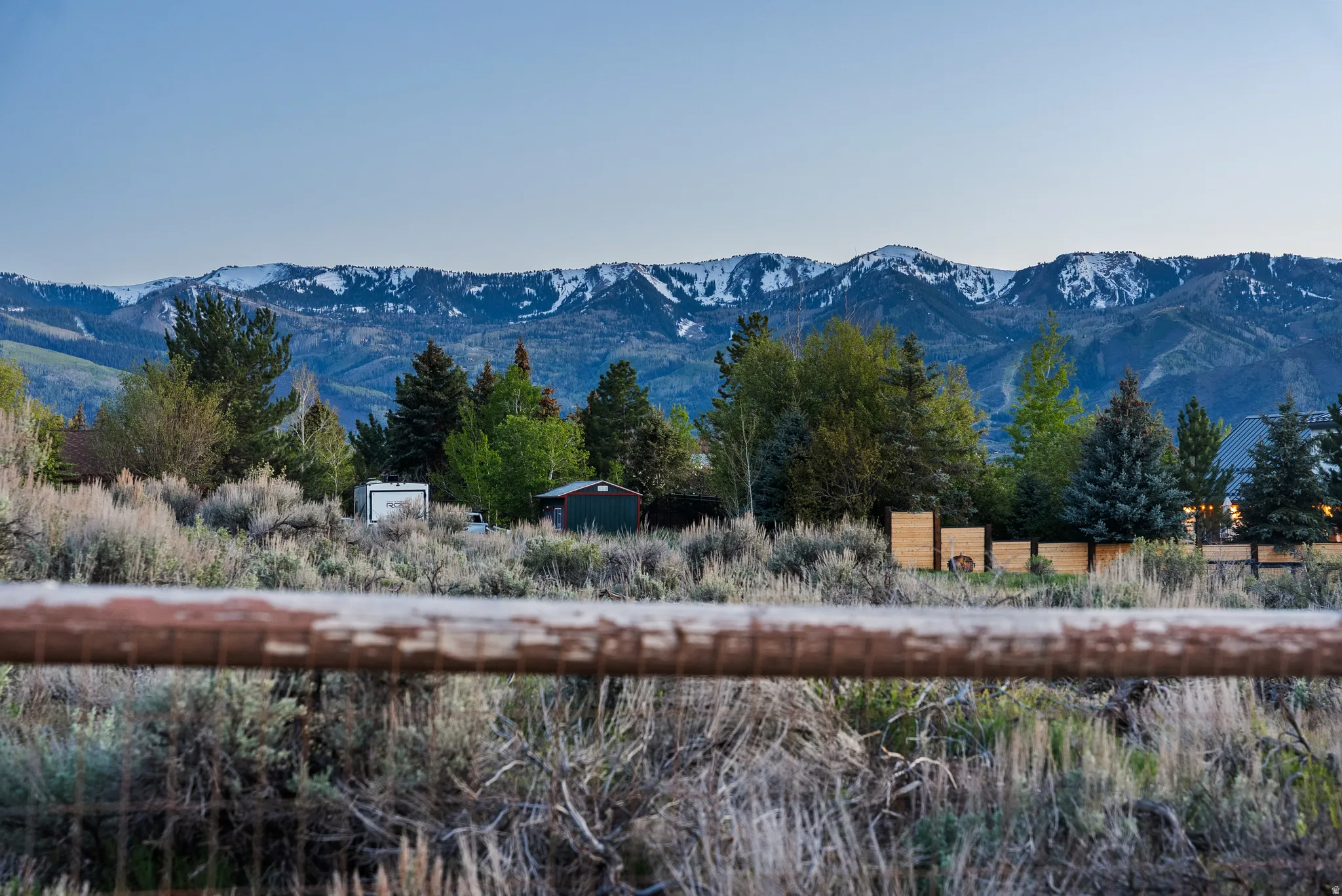 Expansive mountain scenery with snow-capped peaks