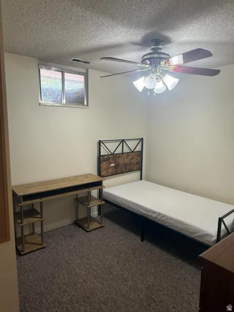 Neutral wall paint complements textured carpeting