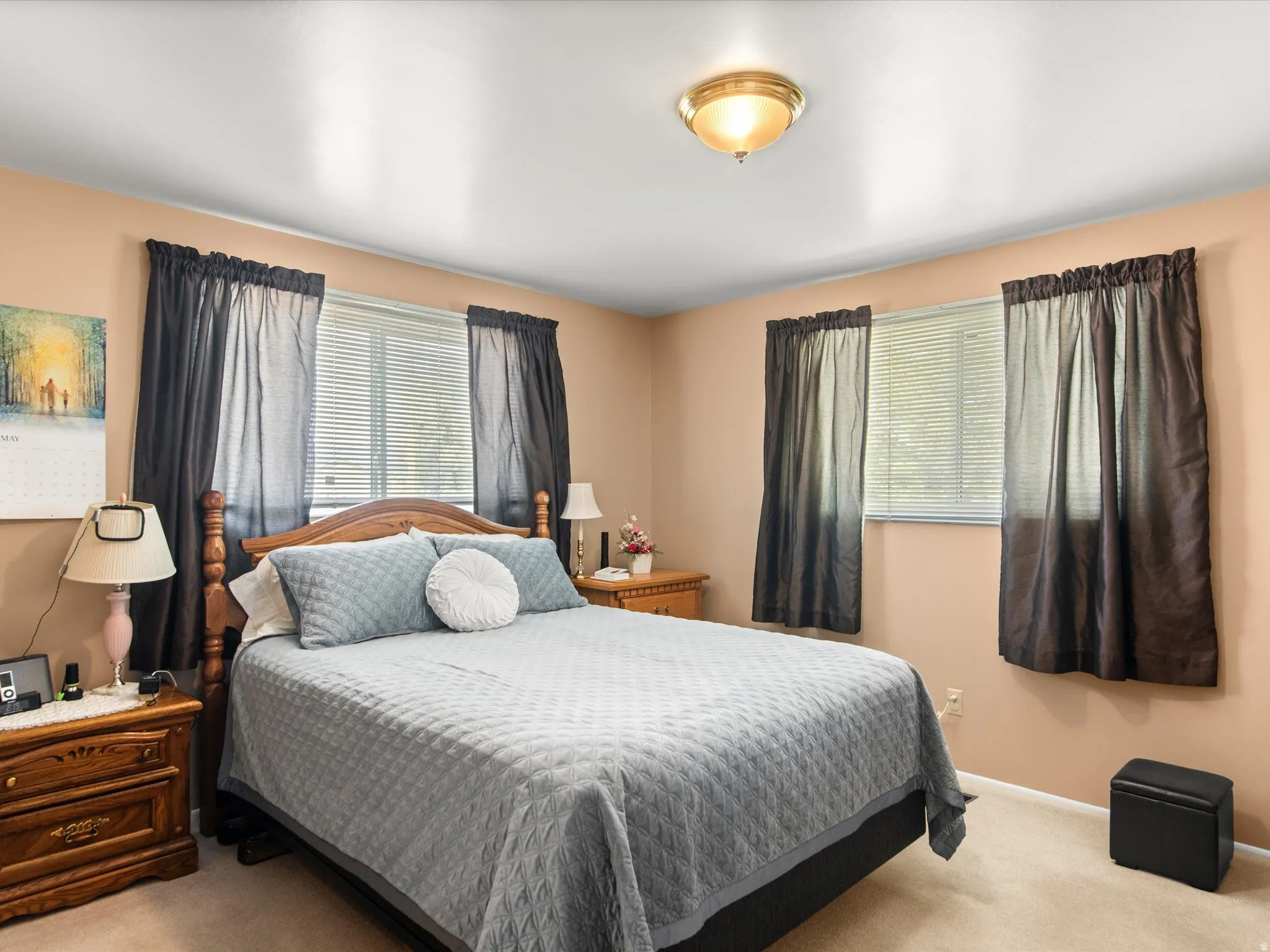 Bedroom featuring soft wall tones and carpeted flooring