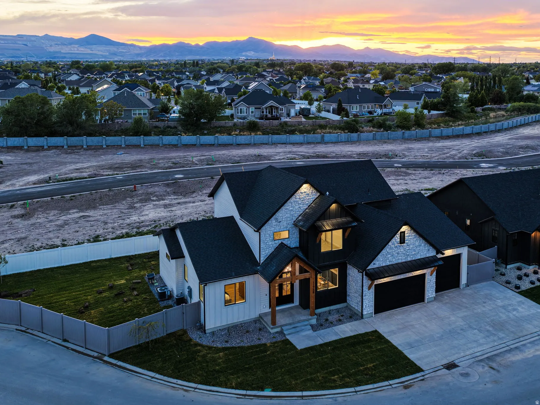 Modern home with a stone and board-and-batten exterior