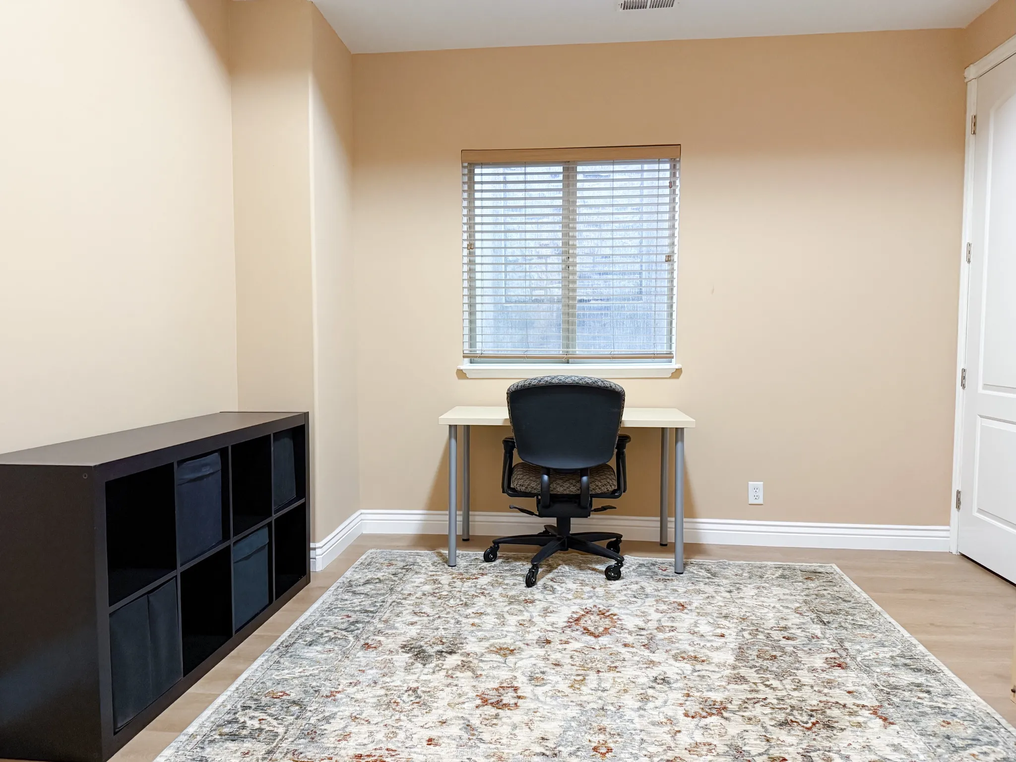 Neutral tone walls with white trim