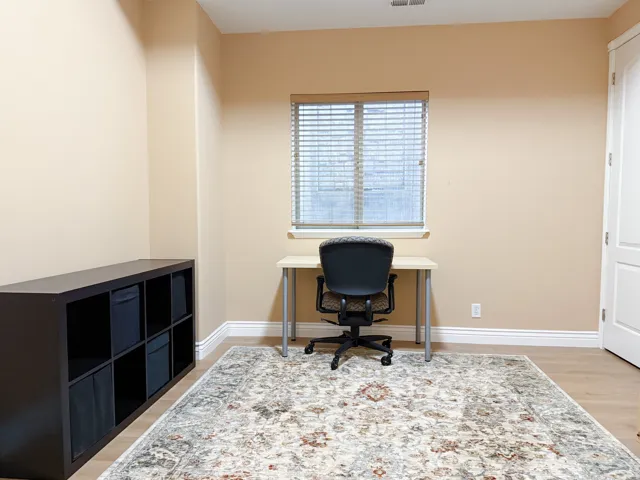 Neutral tone walls with white trim