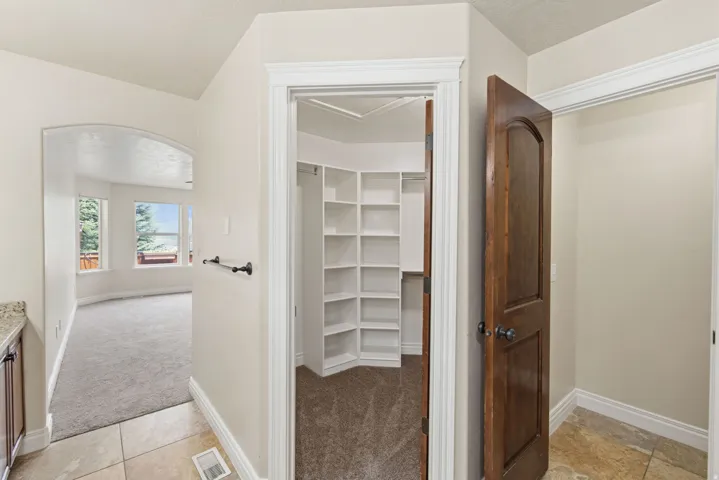 Primary Walk In Closet & Private Toilet Room