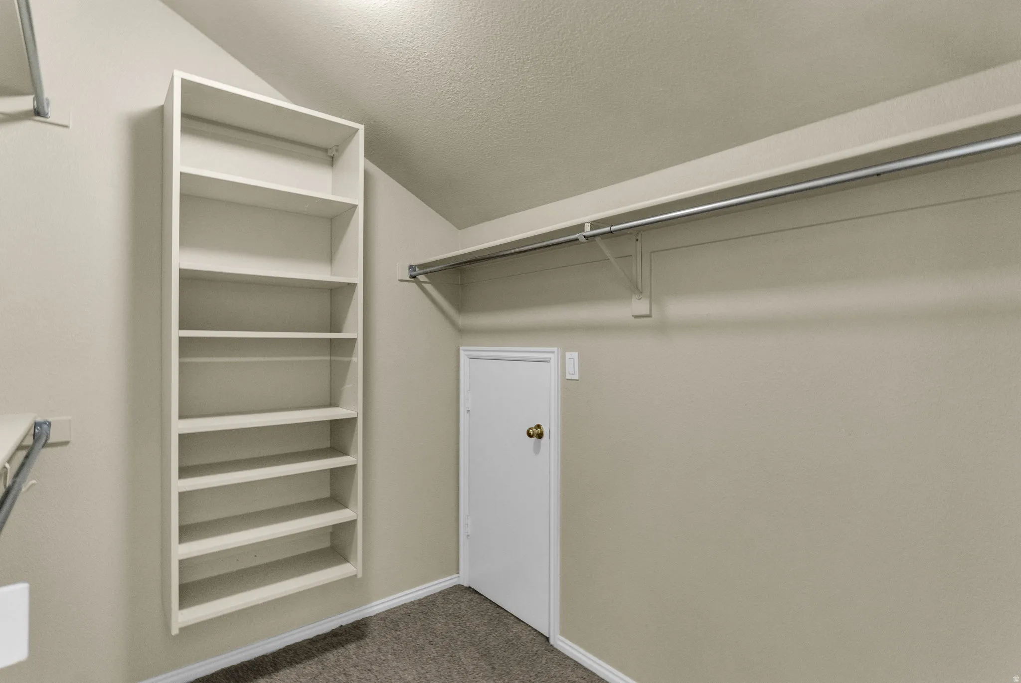 Built-in shelving unit providing vertical storage