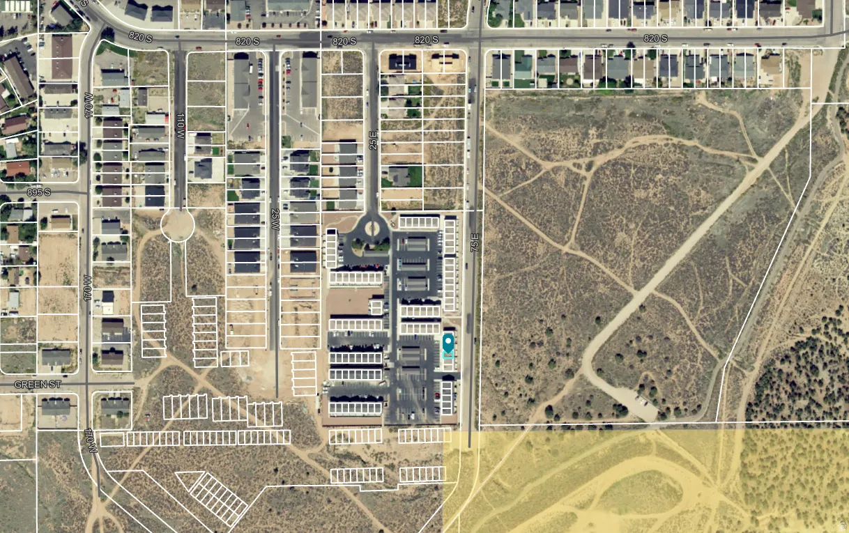 Aerial Survey, Property Boundaries. Illustrating a developed area bordering undeveloped land with marked property lines