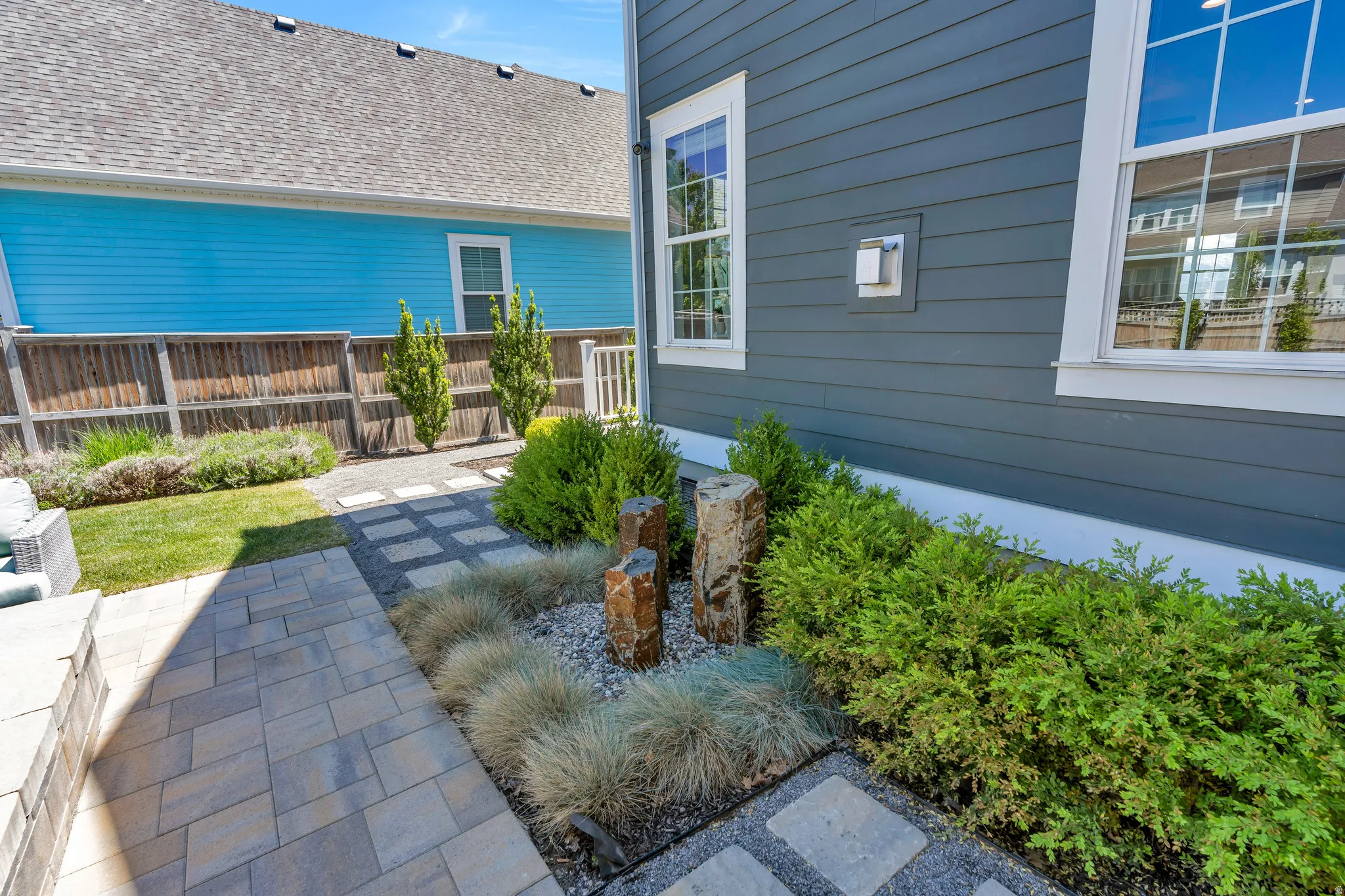 Showcasing the homes water feature and minimalistic greenery