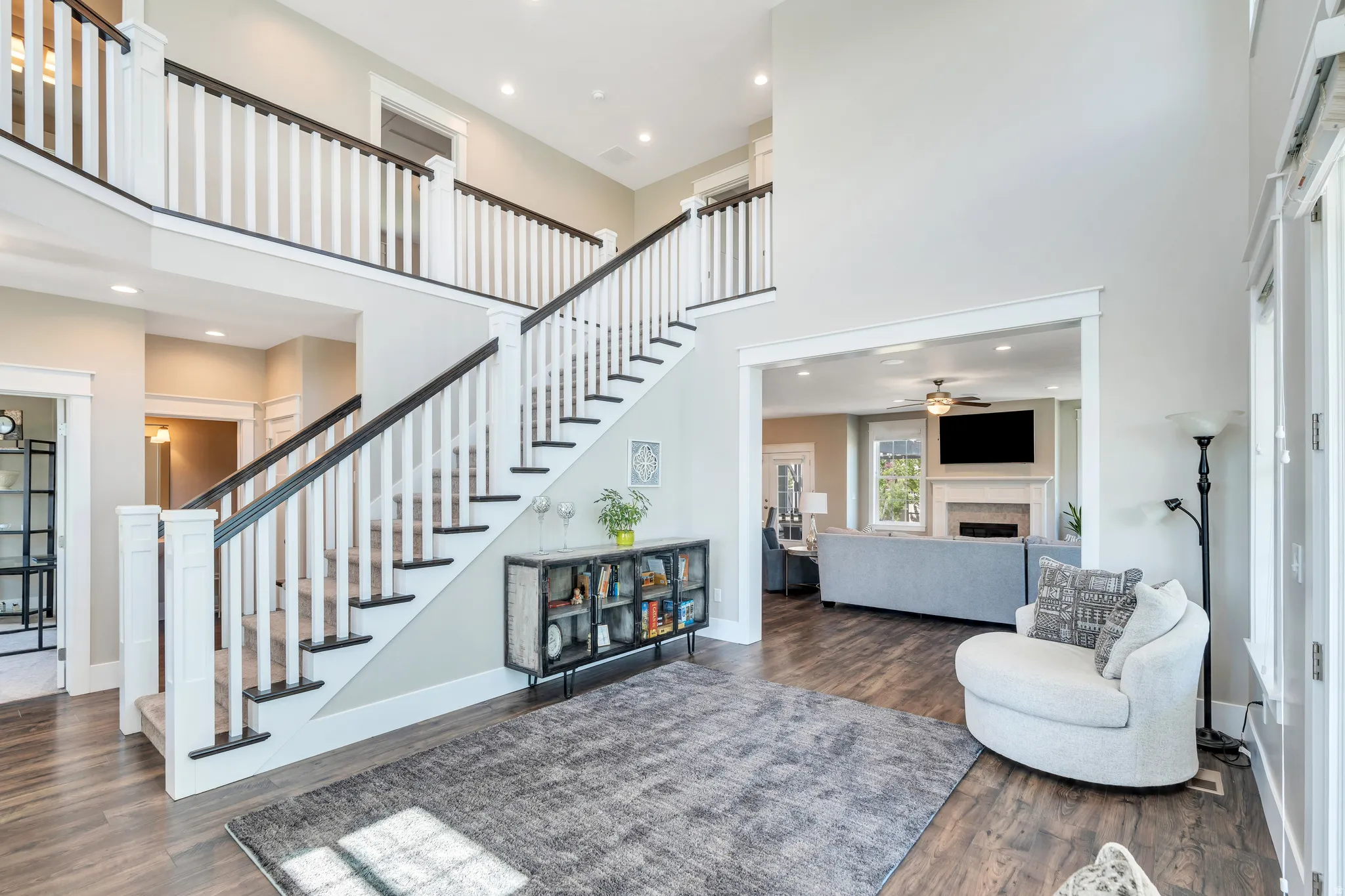 Gorgeous room perfect for additional seating, with access to the living room, and lower-level rooms