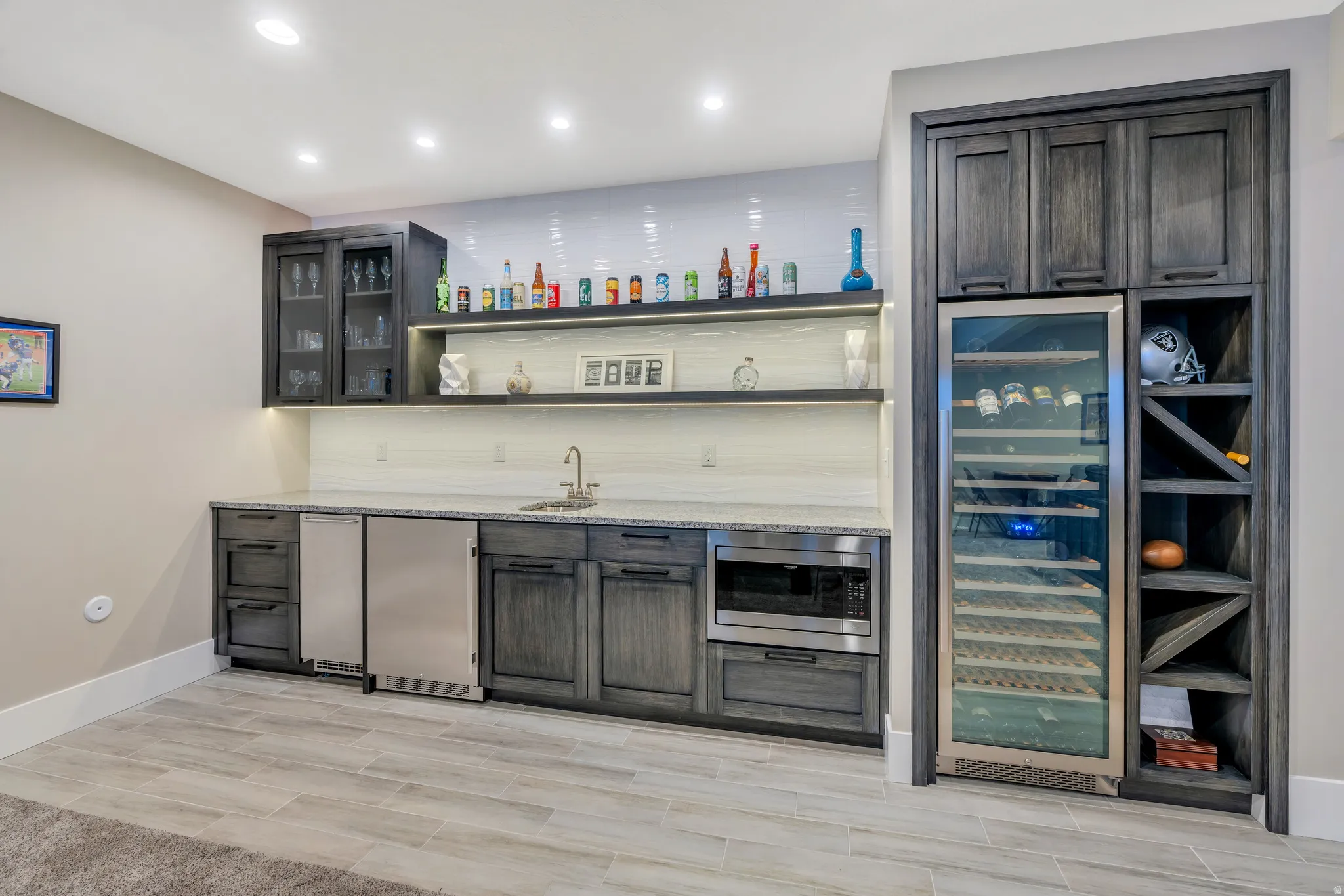 Gorgeous wet bar kitchenette with full wine/drink fridge, mini fridge and more!