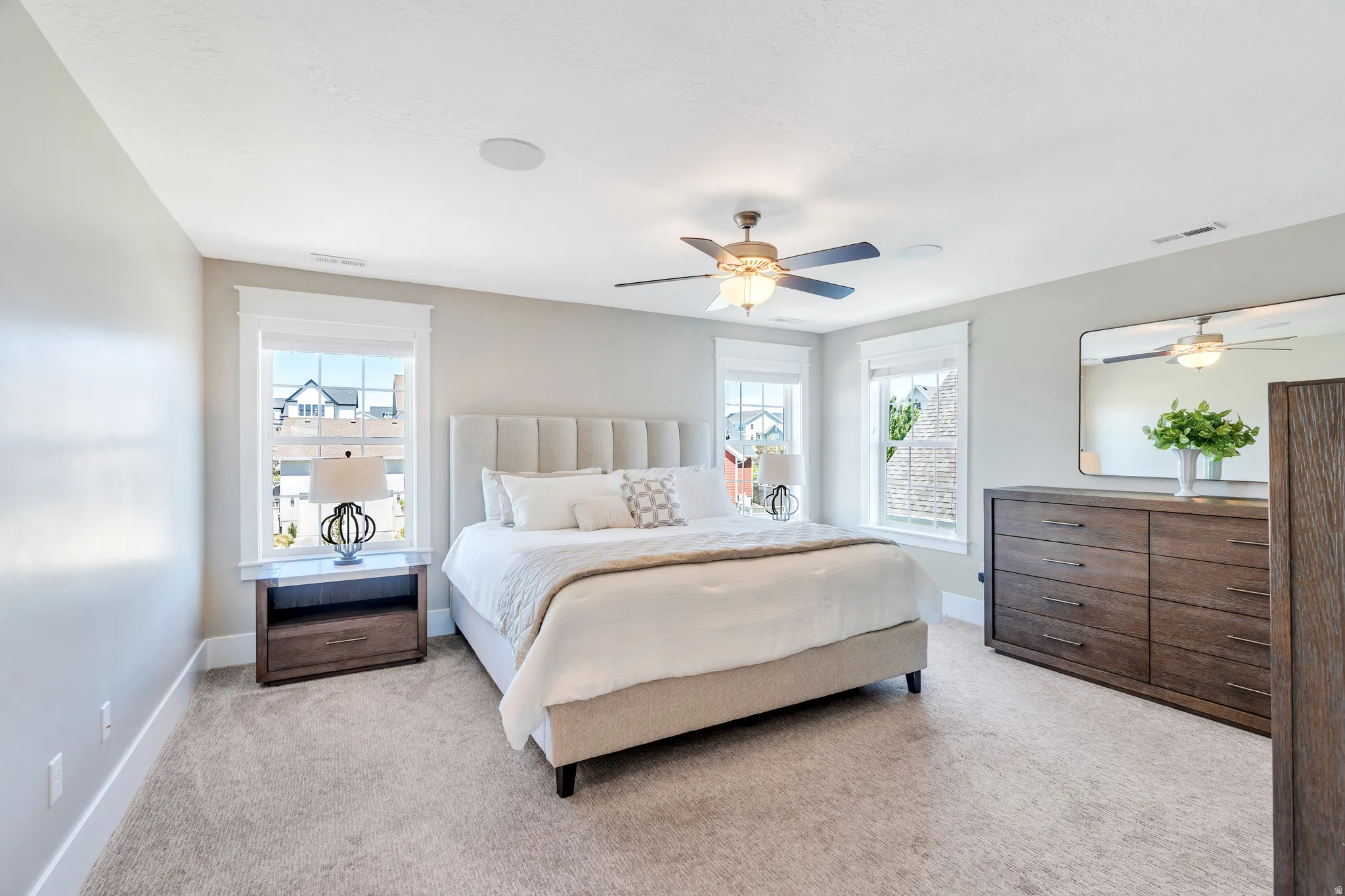 Gorgeous, bright primary suite with ample natural light