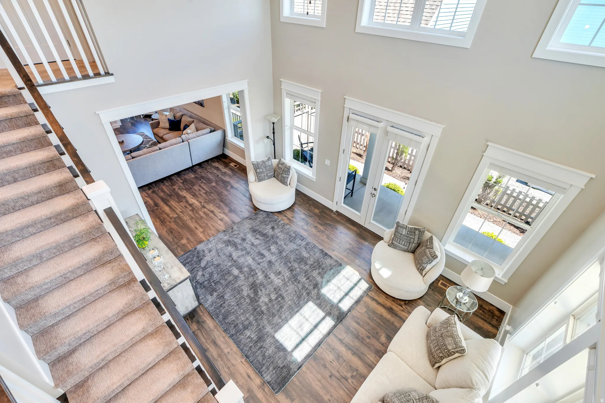 Showcasing ample natural light to flow throughout the home opening up the space