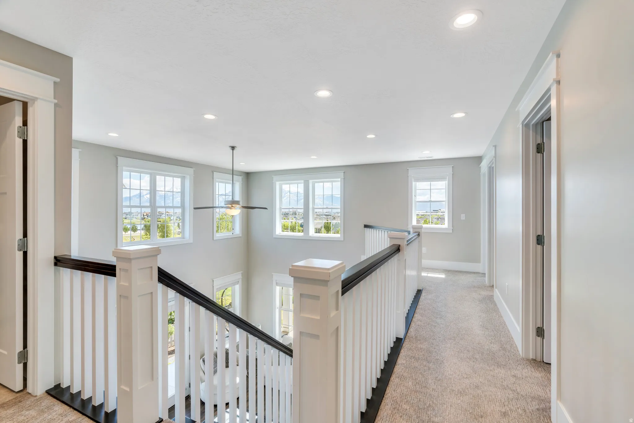 Showcasing the stunning natural light shown through, with access to the upper level bedrooms