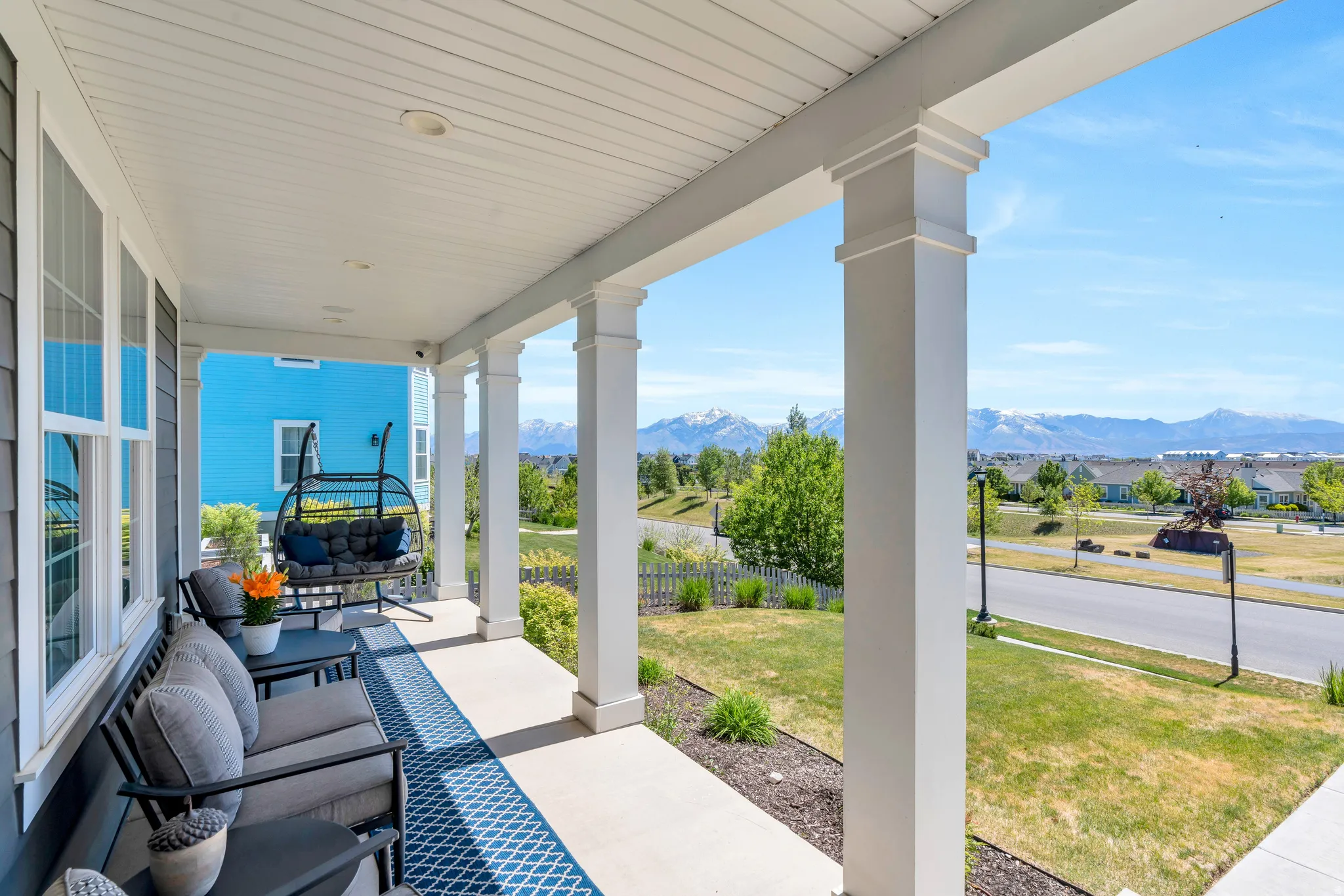 Featuring this gorgeous, covered wrap around porch perfect space to watch the sunset and sunrise