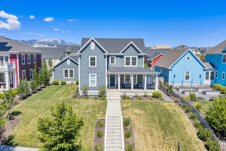 Stunning curb appeal home featuring mature landscaping, and generous yard