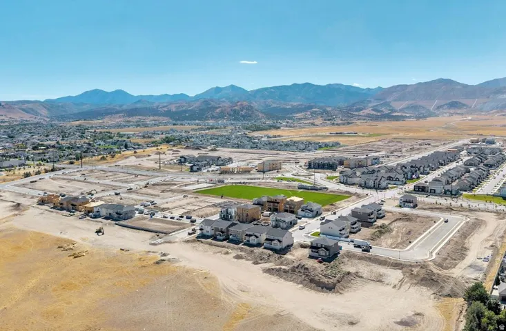 Expansive aerial perspective showcasing a developing residential community