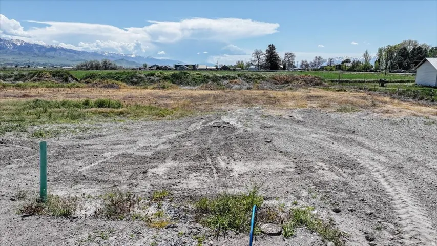 Expansive land parcel featuring a level, cleared building site
