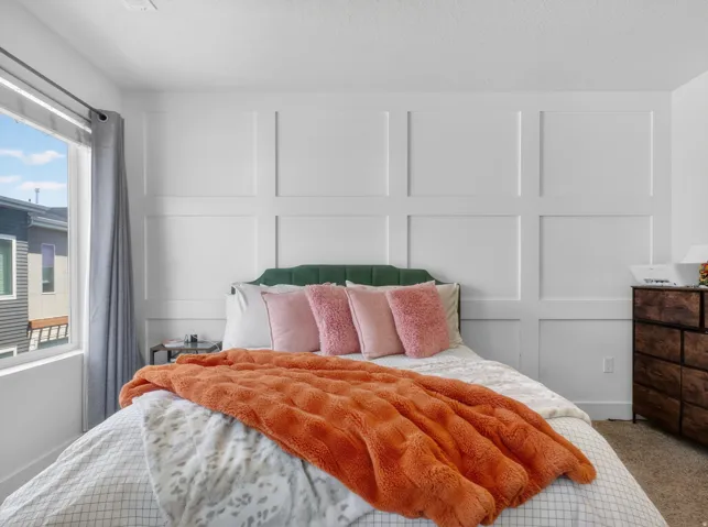 Accent wall featuring decorative paneling