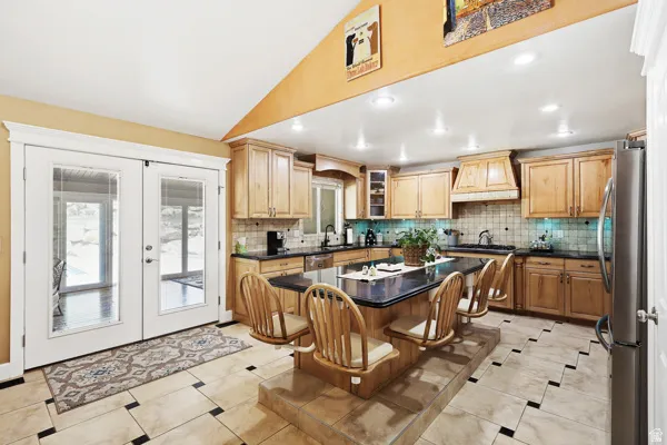 Open Kitchen with Entry to the Sun Room