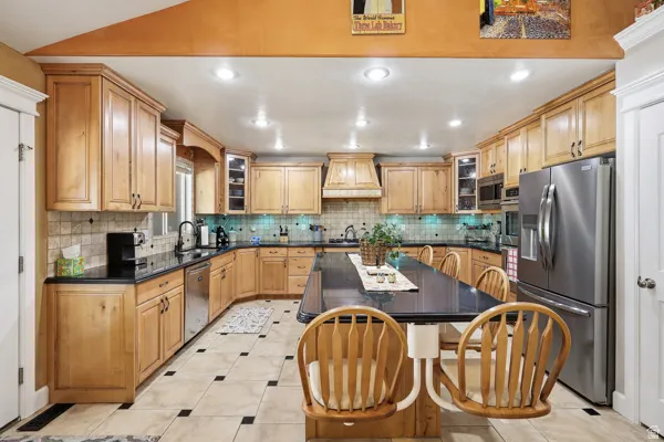Spacious Kitchen with a Large Island & Built-in Seating