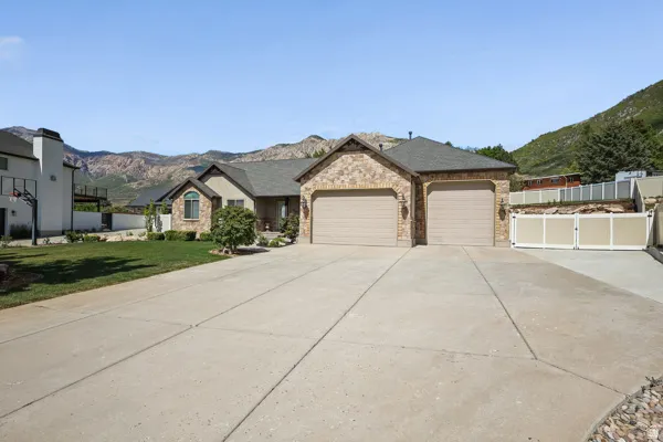 Huge Driveway for Extra Parking, 12' Garage Door for RV, plus Extra Parking for RV, Toys, & Trailers.