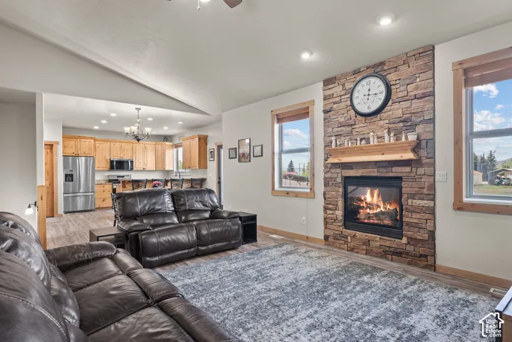 Stone-faced fireplace with a wood mantel