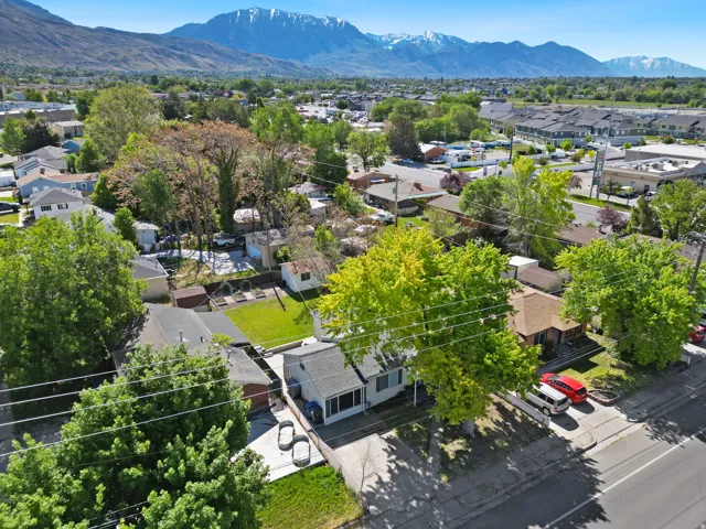 Aerial perspective showcasing the property with a mountainous backdrop