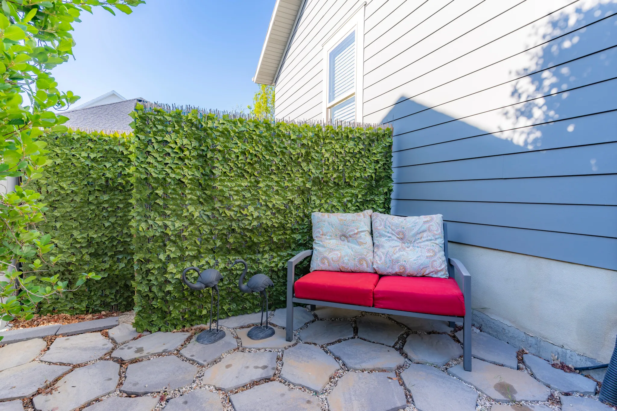 Patio area featuring flagstone paving with gravel fill