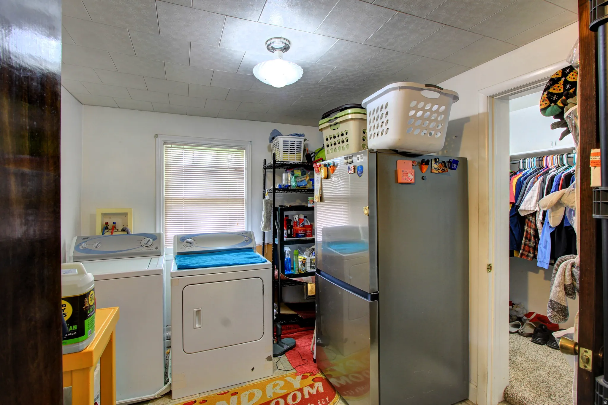 Dedicated laundry area featuring a washer and dryer