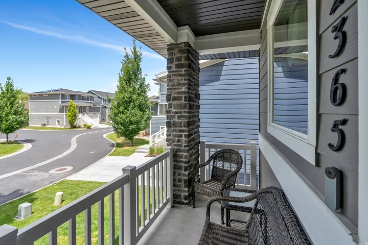 Covered front porch in quiet neighborhood