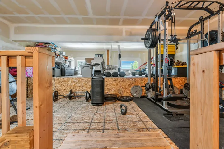 extra tall garage platform has plenty of room for storage or other uses.