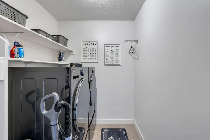 Laundry room is convenient to family bedrooms